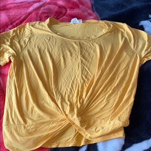 A stretchy yellow tee